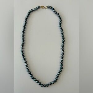 Black fresh water cultured pearl 18” necklace.
